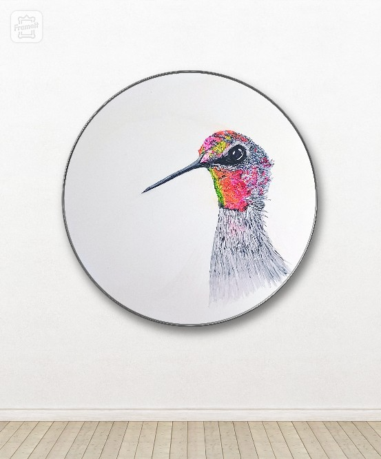 A mockup view of a larger print of an exquisite fine art piece showcasing Bird Feathers - a vibrant juvenile hummingbird with colorful feathers created with alcohol ink on a pristine white paper by The Artful Lynk, Fine Art by Lynda Krupa
